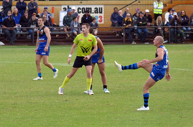 WAFL Australian Football PLayer kicking for goal