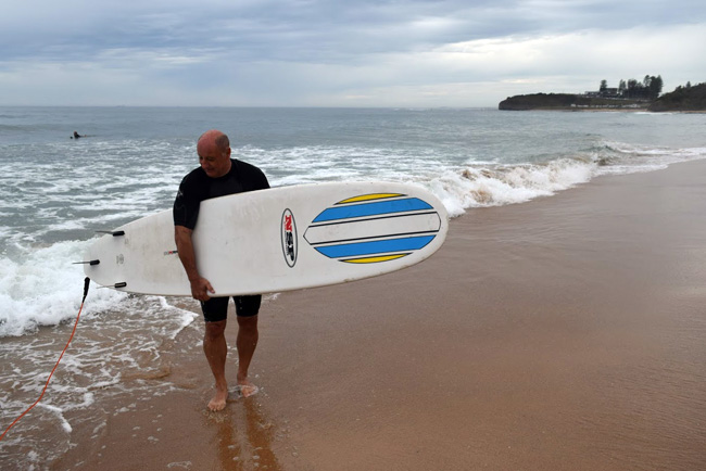 Balancing the board at the beach