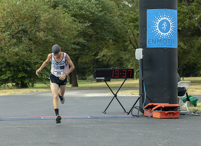 exhausted athlete finishing the race