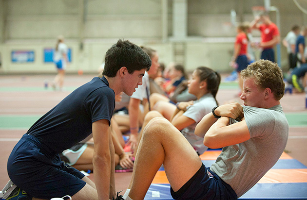 second five sit-ups, the arms are folded over chest