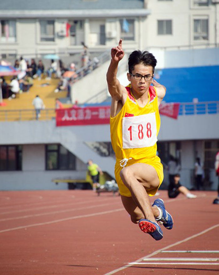 Triple jumper taking the step